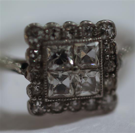 Two 1920s/1930s diamond cluster rings, sizes L & J respectively.